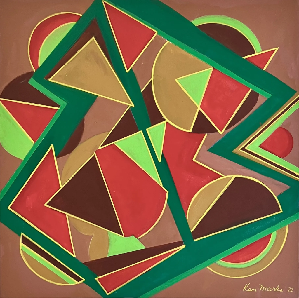 An abstract geometric painting titled "Fiesta" featuring a dense, centralized cluster of sharp triangles, semicircles, and overlapping angular fragments set against a solid warm brown background. Thick, dark green zigzagging bands weave dramatically across the canvas, forming a sharp, complex framework that overlays and sections the composition. The geometric shapes packed within this structural grid are painted in an earthy yet festive palette of vibrant red, lime green, deep burgundy, and sandy tan. Many of these elements are accented with thin, crisp yellow-gold outlines that make them stand out. The artist's signature, "Ken Marks '22," is written in gold script in the bottom right corner.